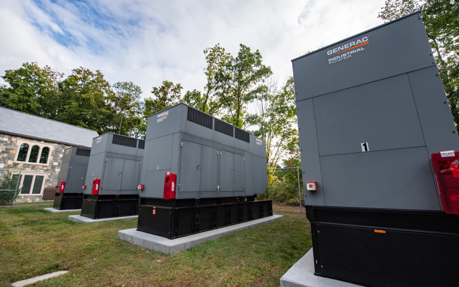 An image of a row of Generac generators.