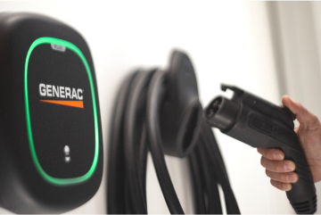 Close up on Generac EV Charger about to be plugged in