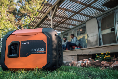 Generac portable generator next to an RV airstream